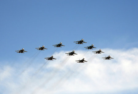 Tactical wing in the group of fighters SU-34, SU-30SM and SU-35 fly during the parade in the sky over Red Square.のeditorial素材