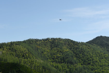 Helicopter over the Chick-Taman pass. Mountain Altai.のeditorial素材