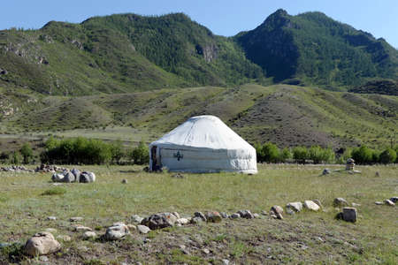 Yurt on the banks of the mountain river. Big Yaloman. altai republic
