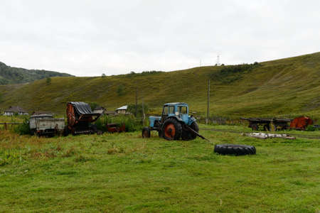 Old tractor MTZ-80 in Altai Territory