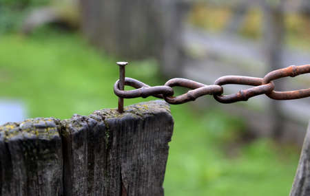 Closed circuit gate rural yard in Western Siberia