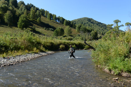 Fishing on the mountain river Yarivka in Western Siberiaのeditorial素材