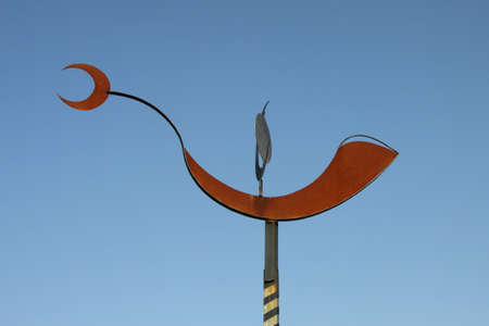 Weather vane on an old building in the Spanish city of Sevilleの写真素材