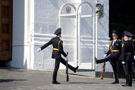 Changing the guard of honor at the post near the gate of the Spasskaya tower on Moscow's red square