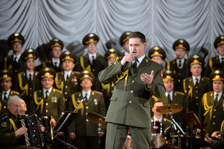 The soloist of the Academic song and dance ensemble of the internal troops of the Ministry of internal Affairs of Russia Vitaly Gerasimenko performsのeditorial素材