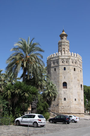 Seville landmark Golden tower of Torre del Oro on the Guadalquivir seafront, Moorish tower, built to protect the harbor of Seville in 1220のeditorial素材