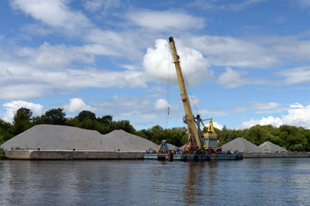 Floating crane on the Moscow canal in the Moscow regionの写真素材