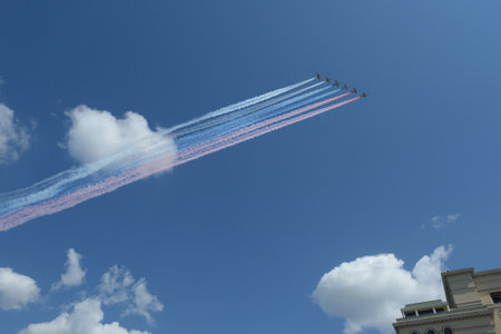 A group of su-25 Grach attack aircraft smoke the colors of the Russian flag in the sky over Moscow during a parade dedicated to the 75th anniversary of victory In the great Patriotic warのeditorial素材
