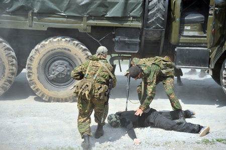 Soldiers of a special purpose unit are working on a military training ground to capture a truckのeditorial素材