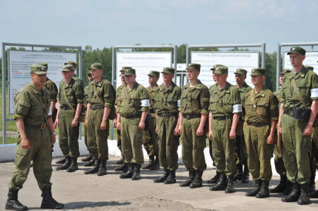 Instructing military personnel at the tank range before shooting practiceのeditorial素材
