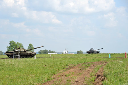 Russian tanks conducts live firing at the training groundのeditorial素材
