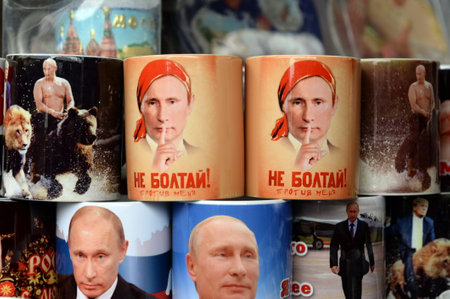Mugs with the image of Russian President Vladimir Putin on the counter of souvenir products in...