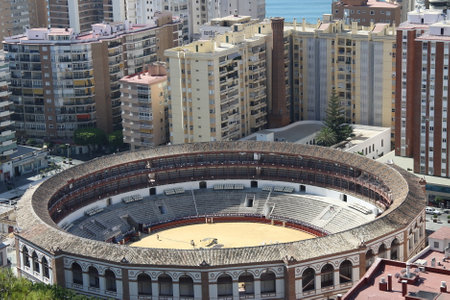 View of the bullring in Modern Malaga, a seaside town in the Spanish region of Andalusia, a resort center on the Mediterranean coastのeditorial素材