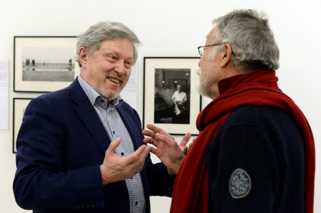 Head of the Yabloko party Grigory Yavlinsky and photojournalist Yuri Rost at a photo exhibition at the Moscow Central Exhibition Hall "Manege"のeditorial素材