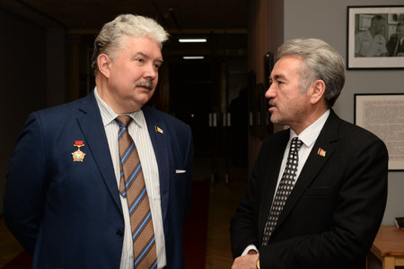 Russian politician and statesman Sergei Baburin at a photo exhibition dedicated to the withdrawal of Soviet troops from the DRA with a representative of the Embassy of Afghanistan in Russiaのeditorial素材