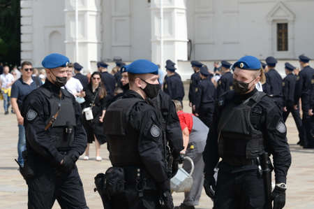 Employees of the federal security Service provide security during the separation of the guards of the Presidential Regiment on the Cathedral Square of the Moscow Kremlinのeditorial素材