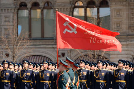 Servicemen of the honor guard company of the separate commandant's Preobrazhensky regiment carry the Victory banner at the dress rehearsal of the paradeのeditorial素材