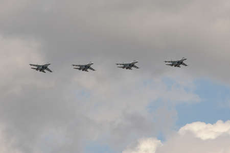 A group of SU-35S multi-purpose fighters in the sky over Moscow's Red Square during the dress...