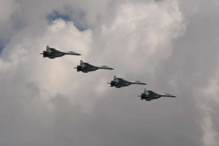 A group of SU-35S multi-purpose fighters in the sky over Moscow's Red Square during the dress...