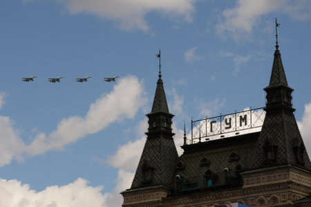 A group of SU-35S multi-purpose fighters in the sky over Moscow's Red Square during the dress rehearsal of the Victory Day air paradeのeditorial素材