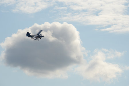 The light multipurpose aircraft TVS-2MS Partizan in the sky at the International Aviation and Space...
