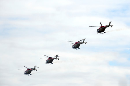 Indian Air Force SARANG aerobatic team on ALH multi-purpose helicopters in the sky of the MAKS-2021...