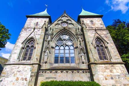 Old temple with green garden in the center of Stavanger, Norway.の写真素材