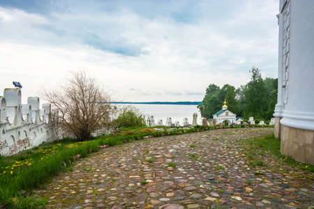 Cobblestone road in front of the Cathedral of the blessed virgin Mary in the village Katunki Nizhny Novgorod region.の写真素材