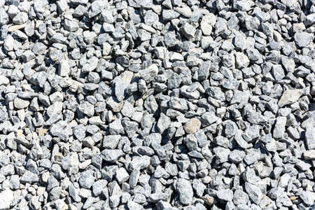 Texture gray gravel of medium size.