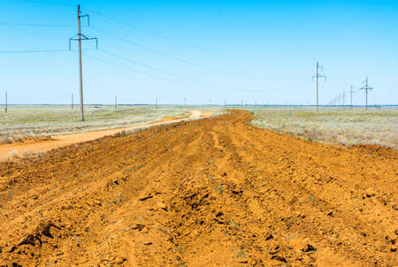 A plowed fire lane in the Astrakhan steppe, Russia.