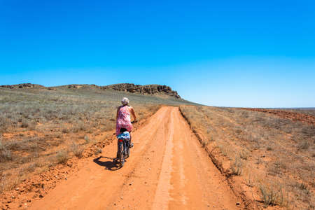 Biking on mount Big Bogdo, Astrakhan region, Russia.の写真素材