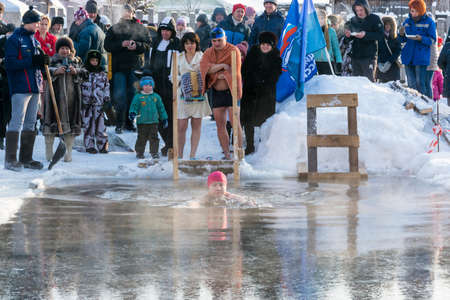 Privolzhsk, Ivanovo region, Russia January 24, 2016: swim in the icy water, 24 January 2016, Privolzhsk, Ivanovo region, Russia.のeditorial素材