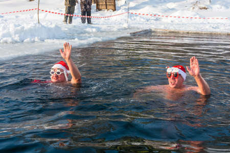 Privolzhsk, Ivanovo region, Russia January 24, 2016: swim in the icy water, 24 January 2016, Privolzhsk, Ivanovo region, Russia.のeditorial素材