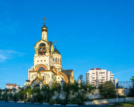 Beautiful Church of St. Prince Vladimir in Sochi in the setting sun.の写真素材