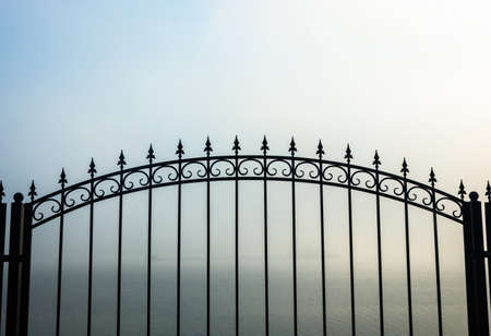 Beautiful forged metal fence on blurred background.の写真素材