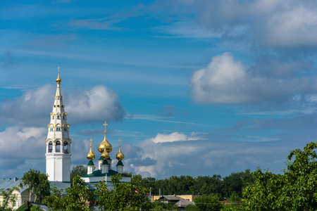 The Golden domes of the Church ensemble in Plyos, Ivanovo region, Russia, on the background of beautiful cloudy sky.の写真素材