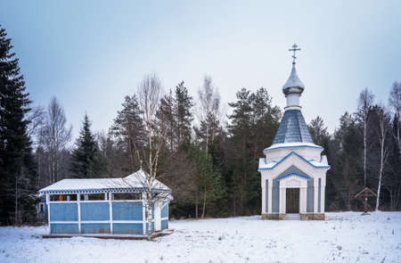 Holy spring of St. Tikhon of Lukh in a cloudy winter day, Timiryazevo village, Ivanovo region, Russia.の写真素材