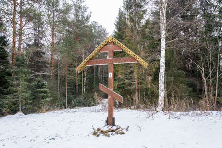 Orthodox wooden cross at the Holy spring of St. Tikhon of Lukh, Timiryazevo village, Ivanovo region, Russia.の写真素材