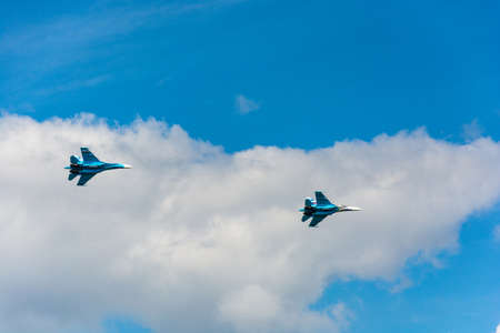 Flying aircraft against a beautiful sky on a Sunny day.の写真素材
