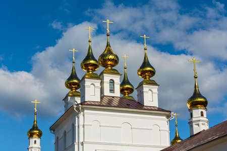 Bright Golden domes of Dormition Cathedral in the city of Ivanovo, Ivanovo region, Russia.の写真素材