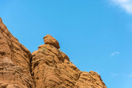 Beautiful bright orange fragment of Aeolian mountains, Kyrgyzstan.