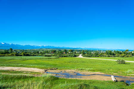 View of the cottage settlement near the village of Mihaylovo in summer Sunny day, Kyrgyzstan.の写真素材