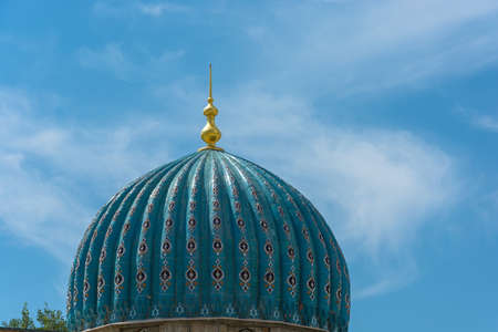 Dome Muslim mosque against the blue sky in Tashkent, Uzbekistan.のeditorial素材
