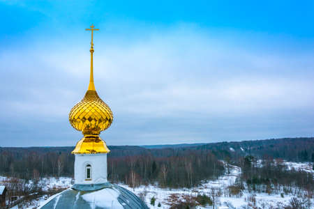 Beautiful Golden Church dome against the blue sky.の写真素材