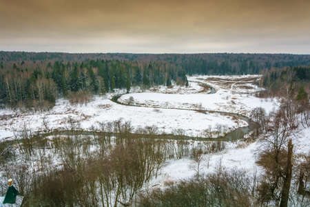 Beautiful Russian with a meandering small river landscape in early winter.の写真素材
