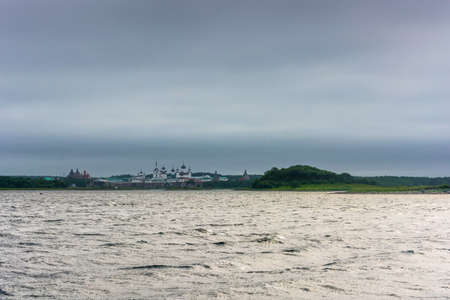 View of the Spaso-Preobrazhensky Solovetsky monastery with Onega bay on a cloudy day, Arkhangelsk oblast, Russia.の写真素材