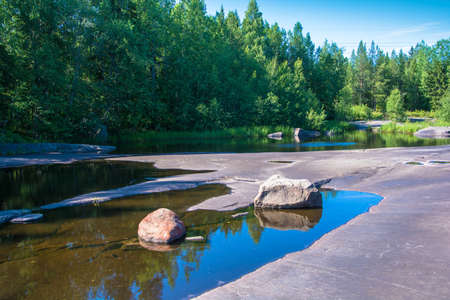 Big stone plateau with the White sea petroglyphs of Karelia, Russia.の写真素材
