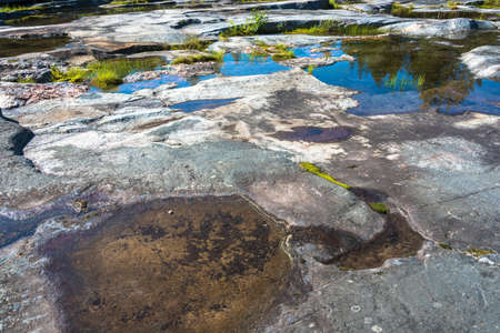 Big stone plateau with the White sea petroglyphs of Karelia, Russia.