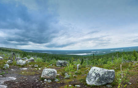 View from the mountain Vottovaara is the highest peak in the reserve on a cloudy day, Karelia, Russia.の写真素材