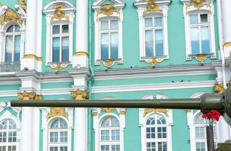 The barrel of Soviet tank T-34 close-up on background of the Winter Palace in St. Petersburg.